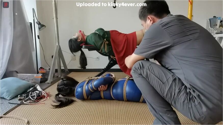 Asian Woman Tied On Top Of Each Other