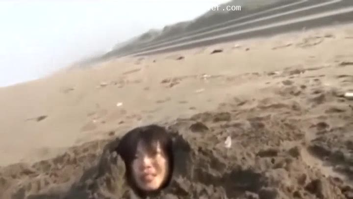 Girl Buried In Beach