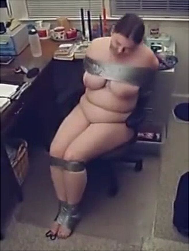 Plump Girl Struggles In Duct Tape Bondage