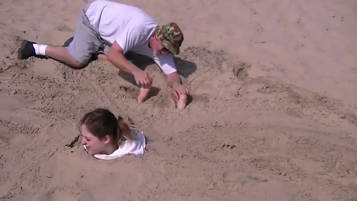 Buried To Sand And Tickled