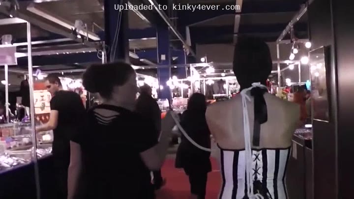 Slave Bound With Rope At Public Event