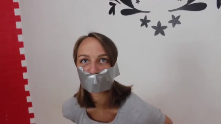 Unknown Woman Wrap Gagged