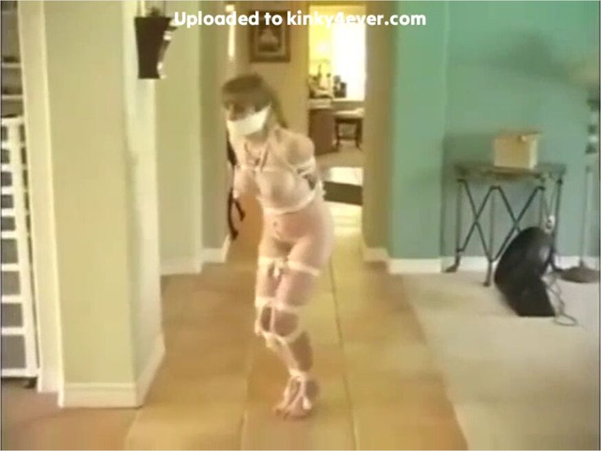 Hopping Around At Home, Gagged And In Tight Rope