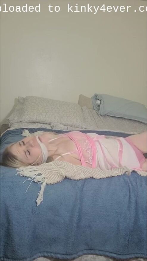 Looking At The Camera As She Is Forced To Cum