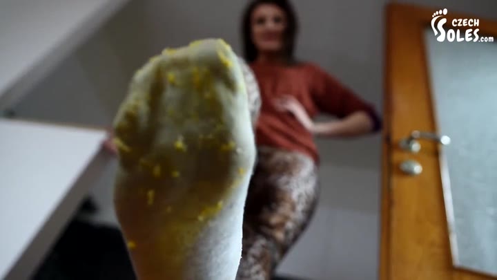 Wild Brunette In Socks Crashes An Orange With Her Feet