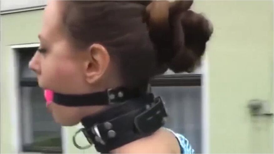 Girl Armbinded And Ballgagged In The Street