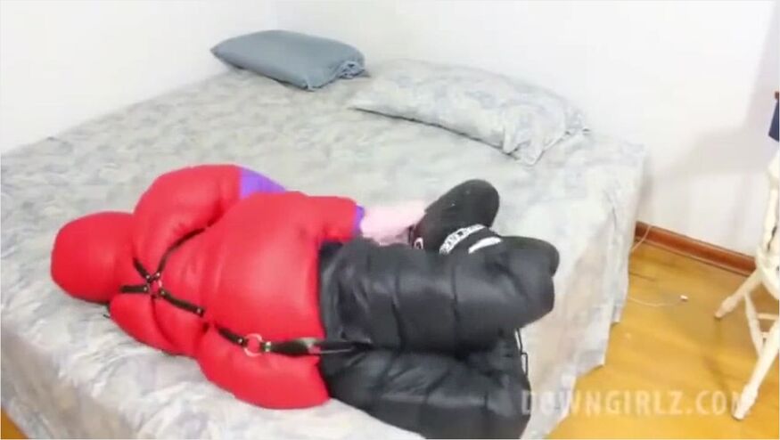 Girl Bound In Red Jacket And Boots