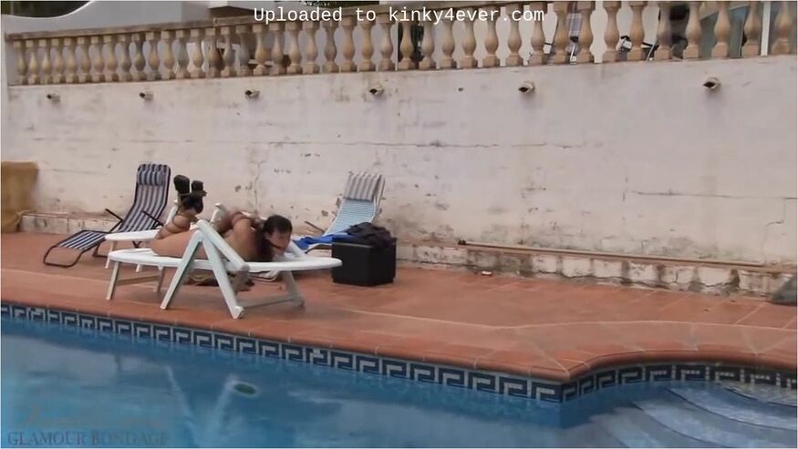 Sun Tanning By The Pool
