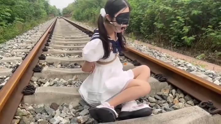 Girl On Train Rails