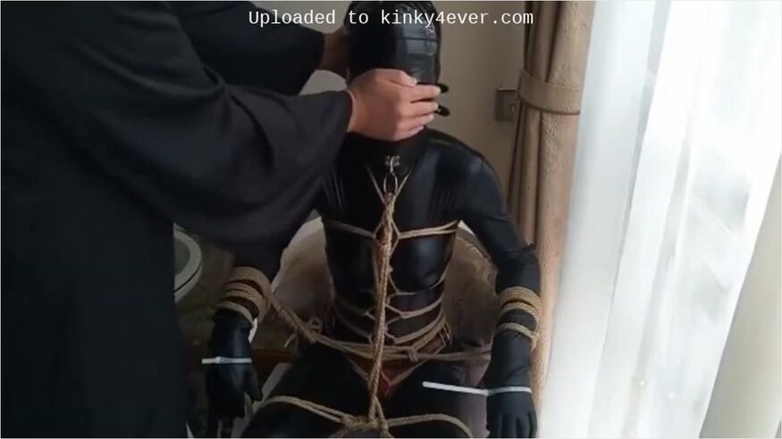 Latex Bondage In A Closet