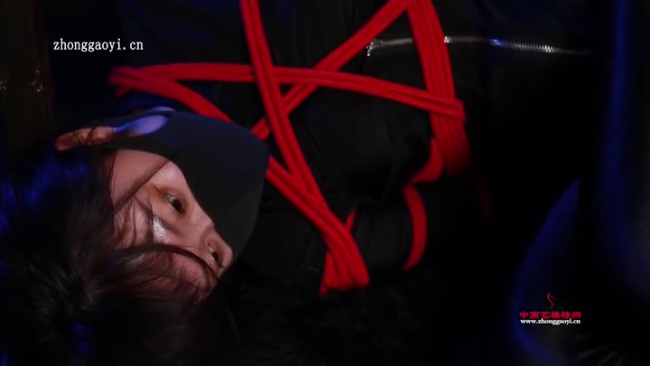 Ninja Girl Tied In Red Ropes