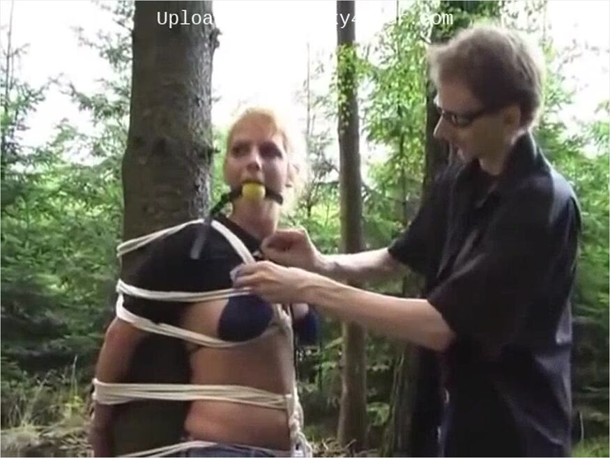 Blonde Tied To A Tree, Ball-gagged, Whipped, Stripped