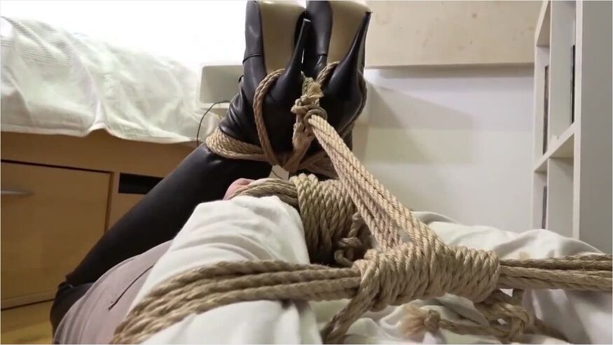 Brunette Hogtied In Leather Boots