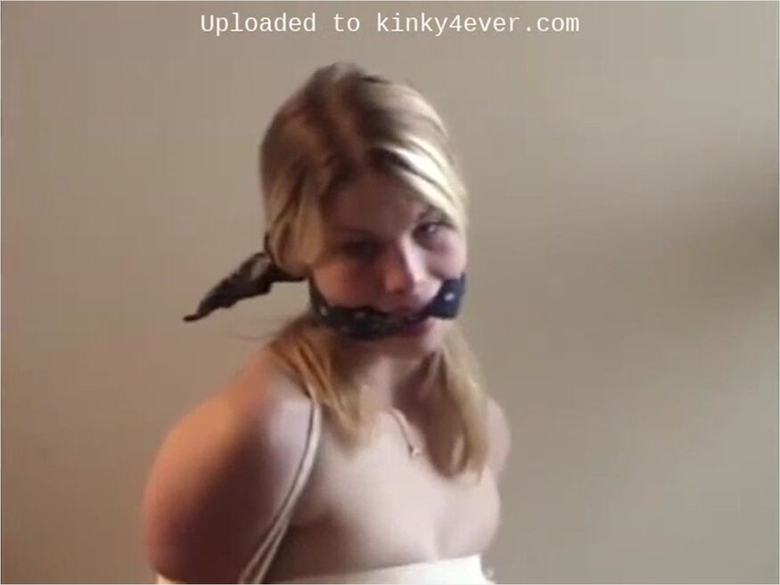 Blond In Stockings And Heels In Tight Rope Bondage