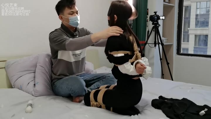 Asian Lady Blindfolded And Bound