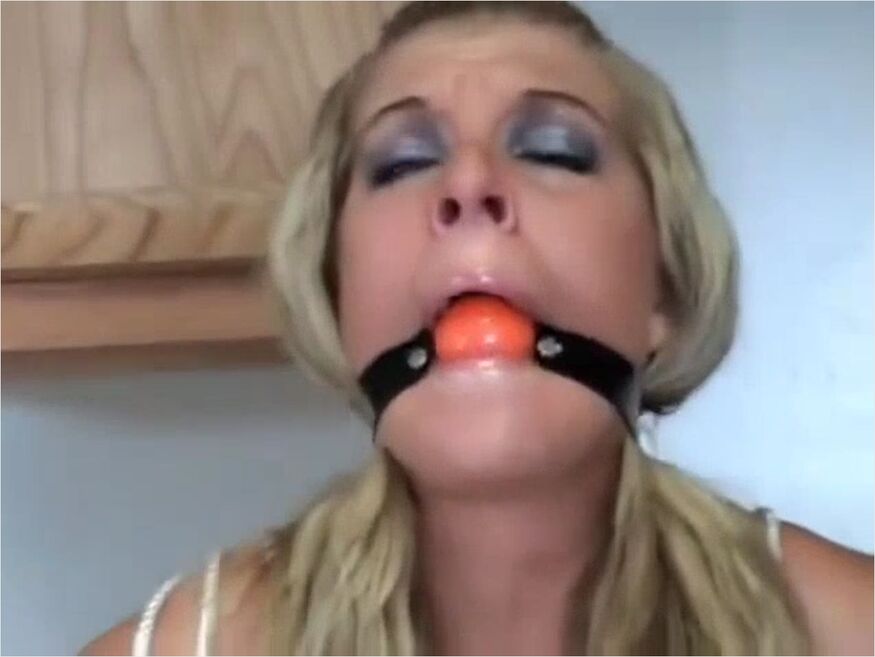 Sexy Woman Tied Up And Ballgagged