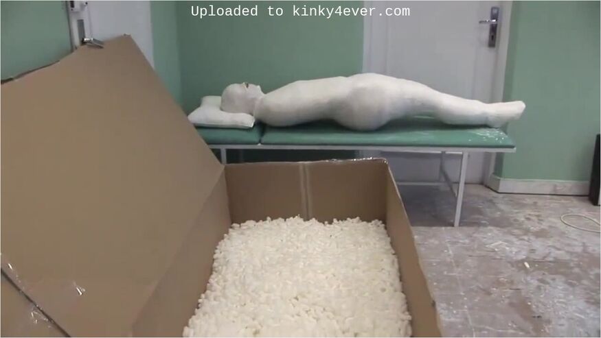 Mummified And Cased Girl