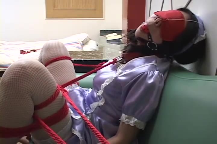 Purple Maid Blindfolded And Bound