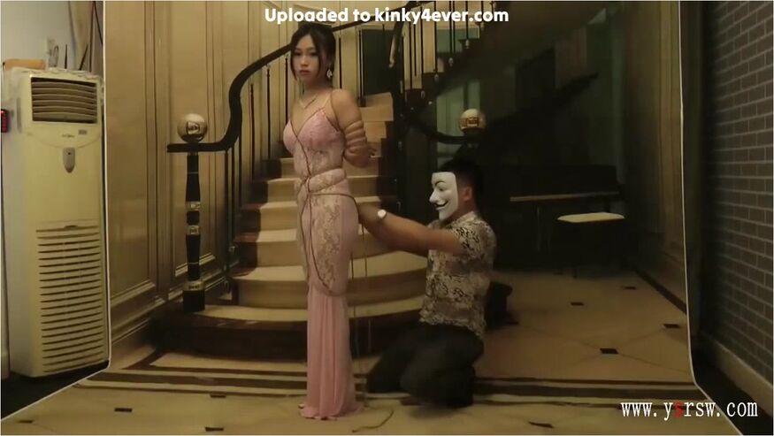 Chinese Girl In Long Dress In Bondage