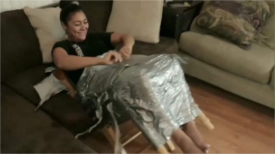 Crystal Mummified To Chair In Duct Tape