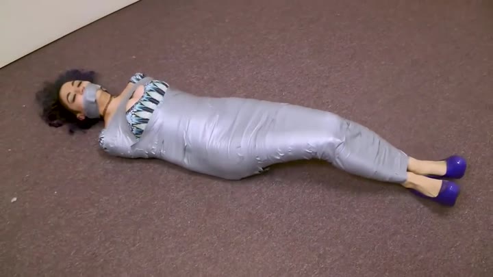 Girl Wrapped Up In Silver Tape