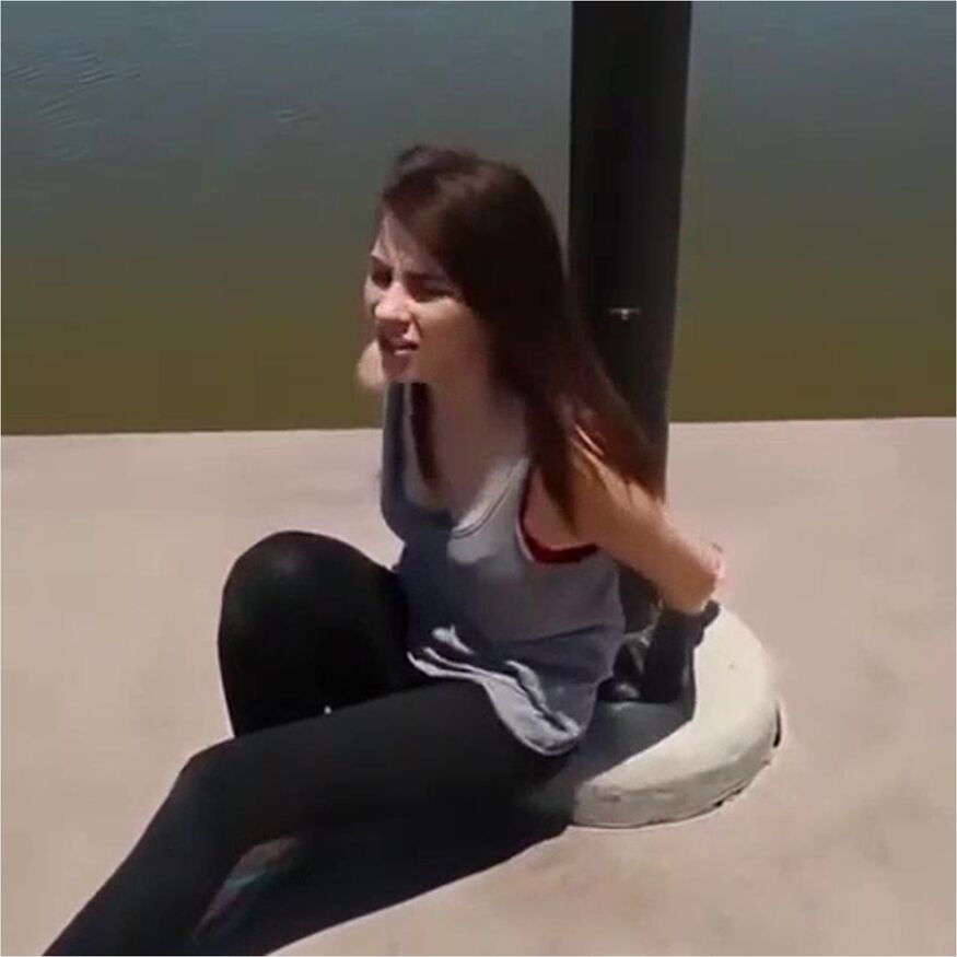 Girl Handcuffed To Lamp Post On River Bank