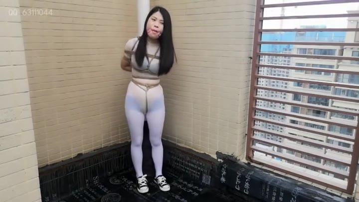 Asian Girl Cuffed On The Roof