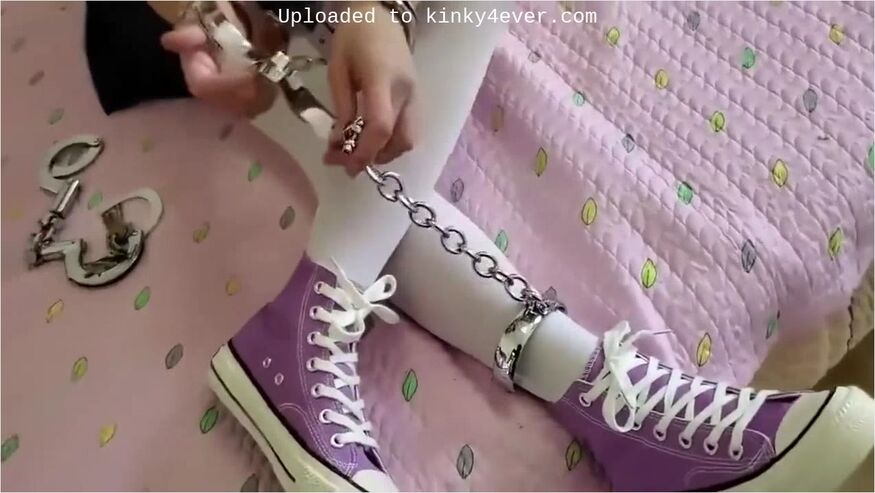 Asian Girl Play With Cuffs