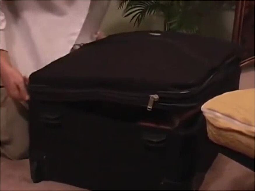 Roped, Gagged, Nylon Encased, Packed Into The Suitcase