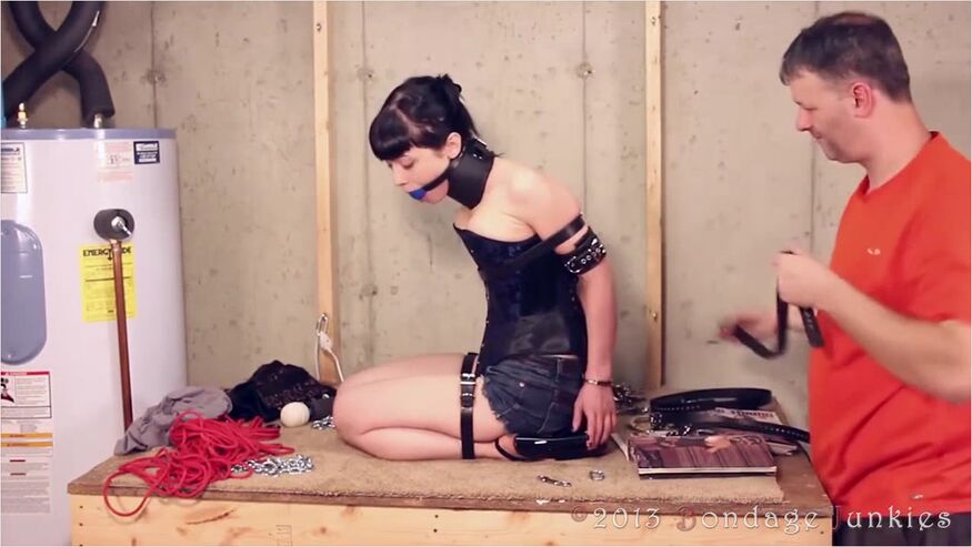 Getting Herself Strapped Up