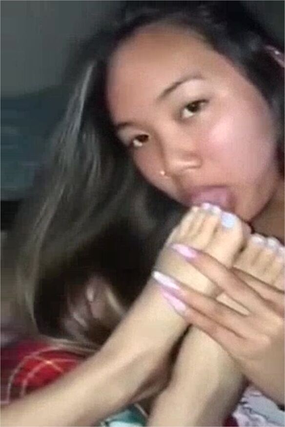 Young Asian teen 18+ Enjoys Sucking Her Girlfriends Amateur Toes In Pov