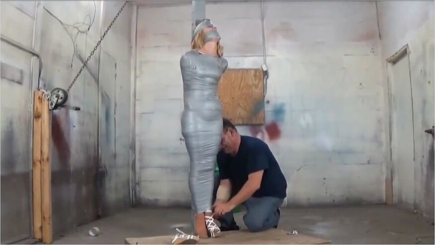 Blonde Taped To A Pole