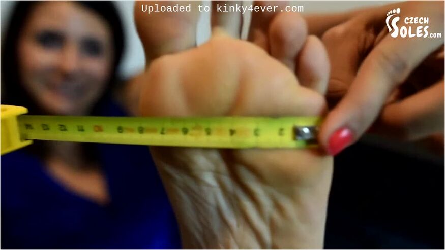 European Beauties Measuring Their Feet And Toes On The Sofa