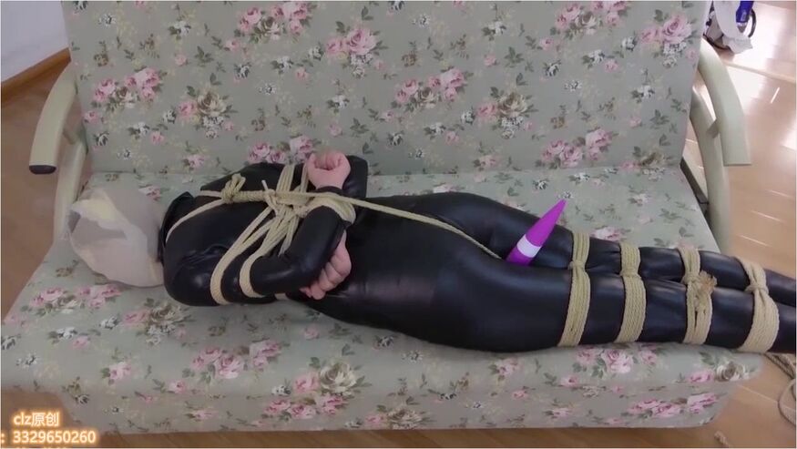 Asian Girl Hooded In Catsuit