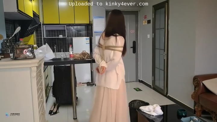 Chinese Girl In Long Dress In Bondage