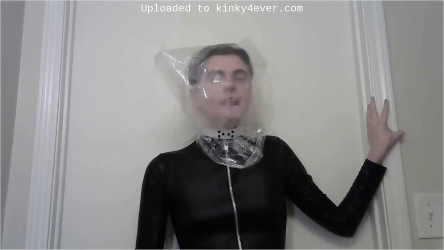 Bagging Breathplay In Leather Catsuit